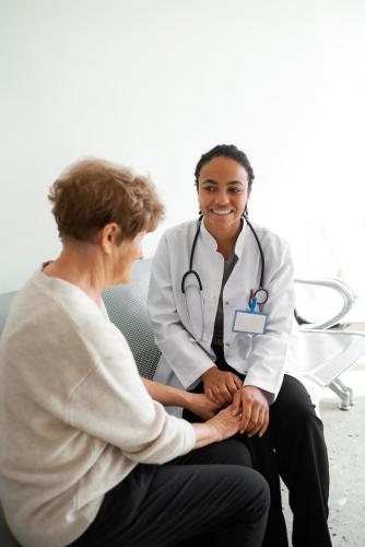 doctor-talking-patient-medium-shot_23-2149856214
